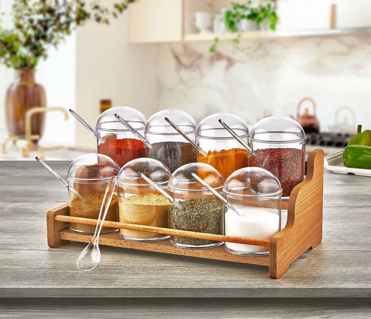 A set of spice boxes consisting of 8 pieces and a wooden stand