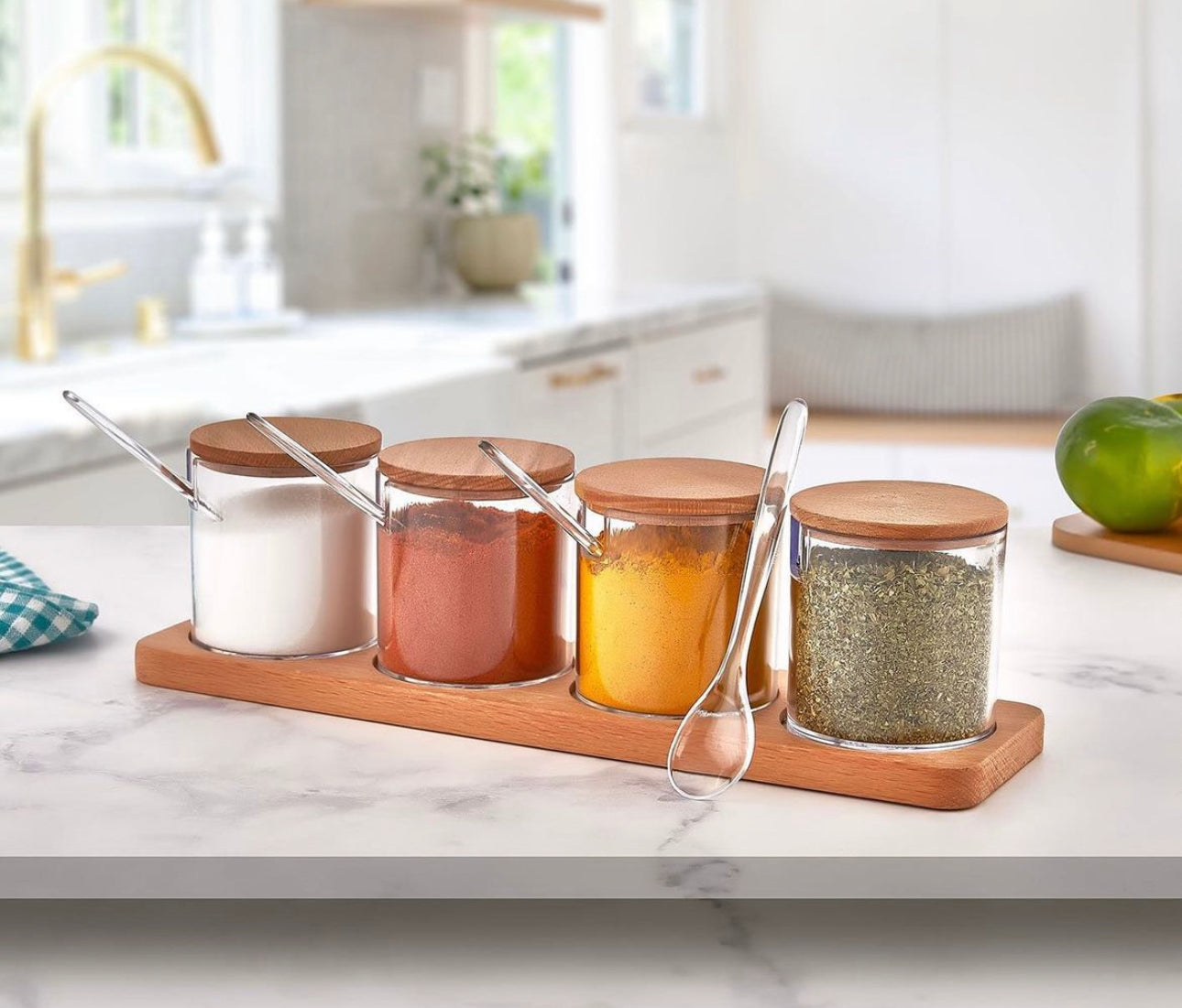 A set of 4-piece plastic spice boxes with a wooden stand