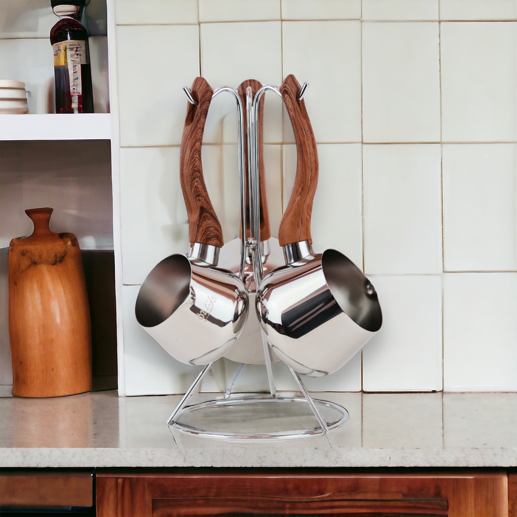 A set of coffee pots with a stand